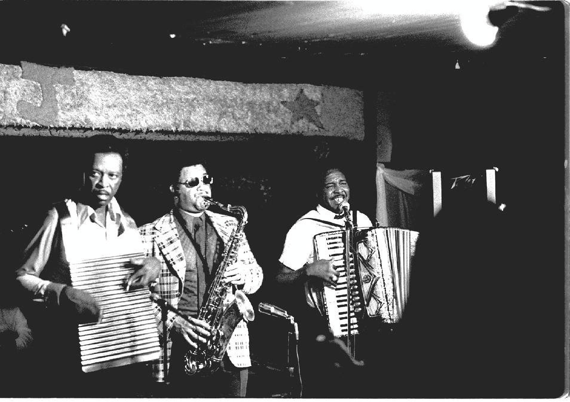 Clifton Chenier on accordion with his brother Cleveland on rubboard and John Hart on saxophone, 1975