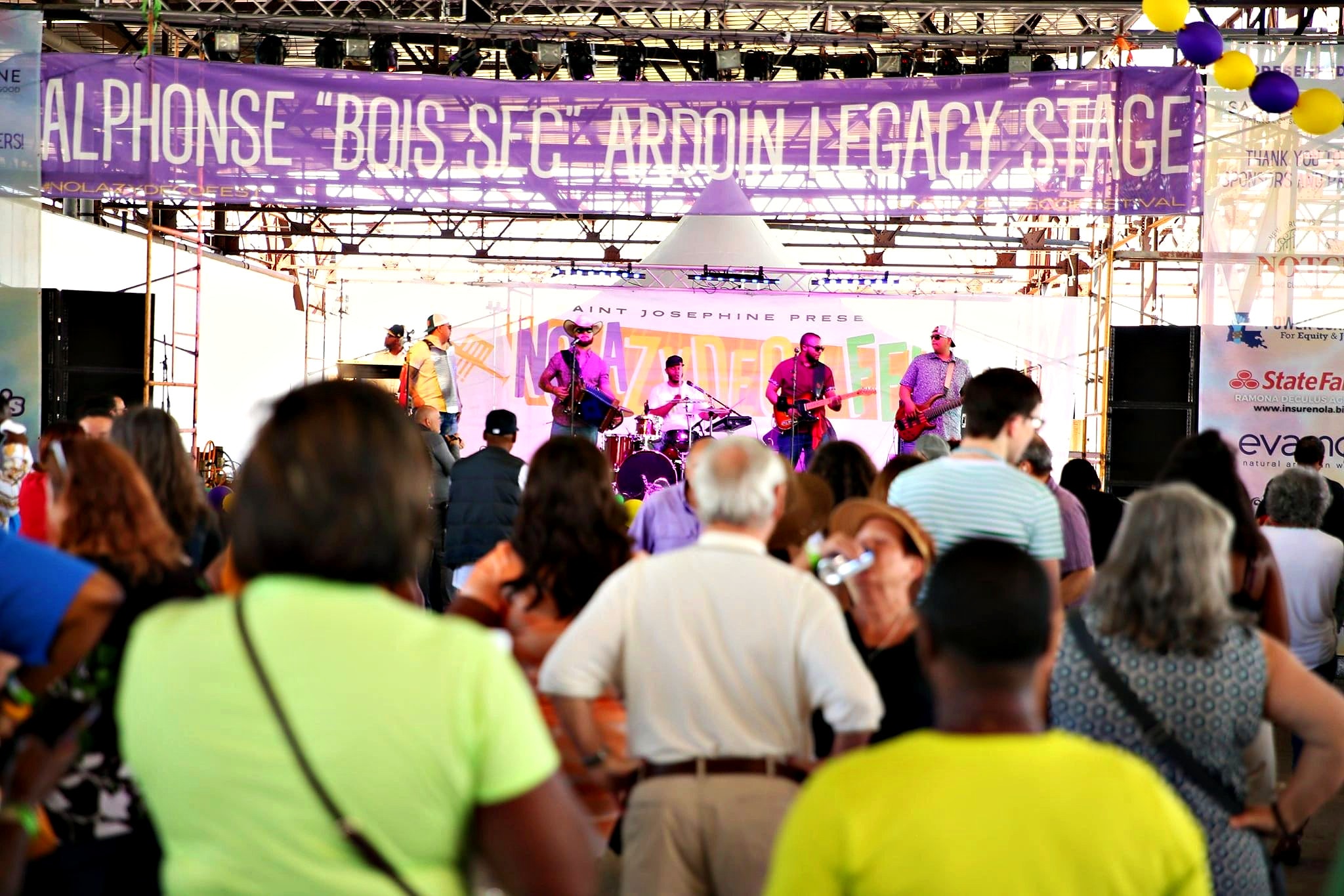 The Alphonse “Bois Sec” Ardoin Legacy Stage with a crowd in front